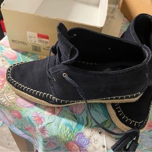 Like new Micheal Kors ankle navy color boots size 9. .5